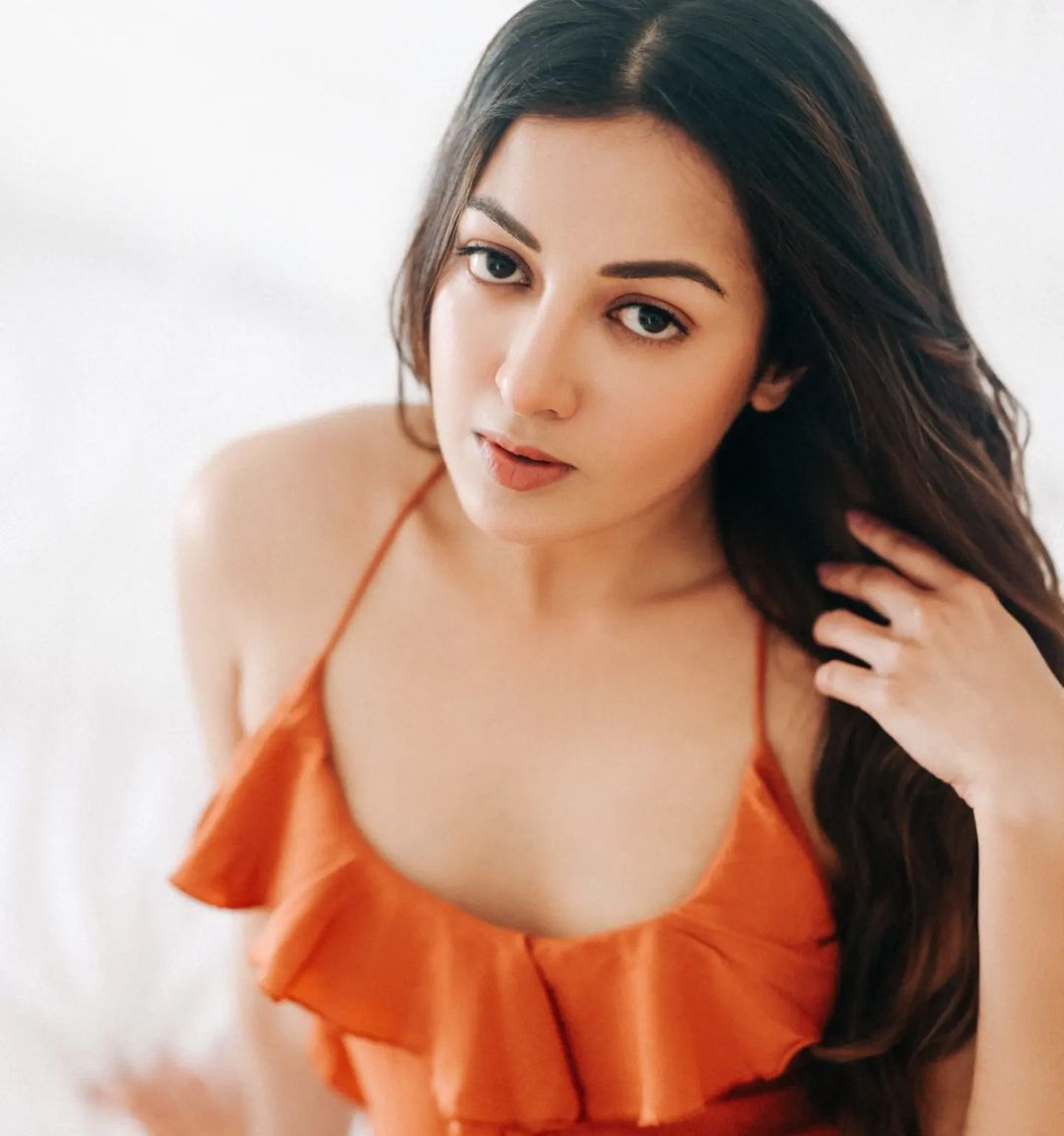 Kollywood Actress Catherine Tresa Long Legs Show in Orange Gown